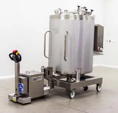 Pharmaceutical suite being reconfigured with modular totes and streamlined process trains