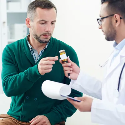 Health professional discussing post-trial treatment options with a patient
