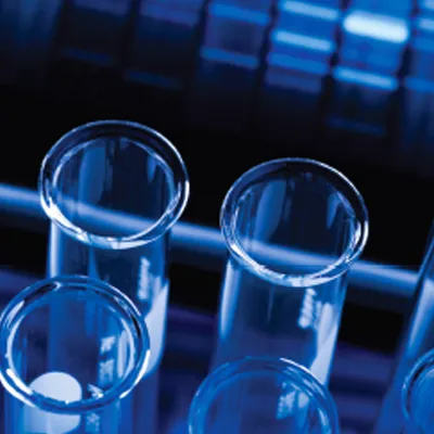 Close-up of laboratory equipment and medical notes on rare diseases