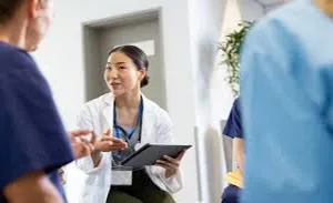 Clinician explaining approved treatments for a patient with a rare disease