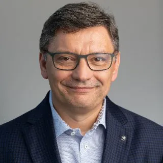 Dr. Gilles Besin